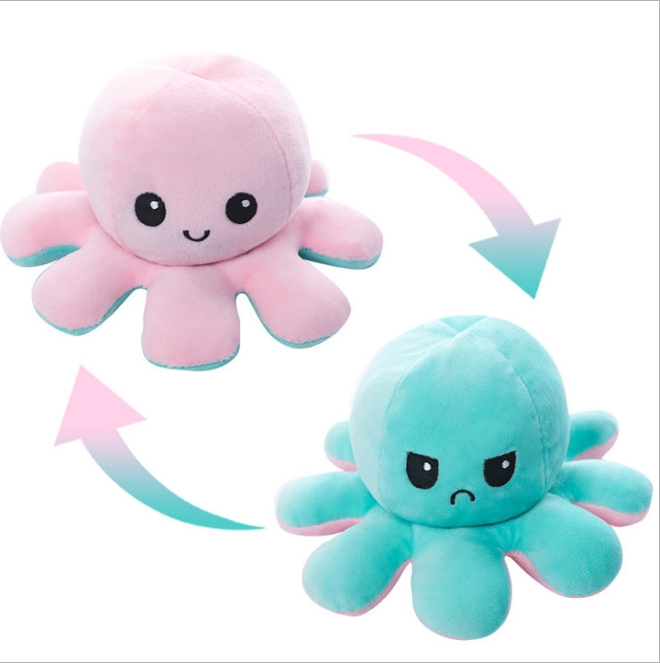 Pieuvre En Peluche Réversible en tissu doux rose et bleu turquoise, visage heureux et triste, vue de face.