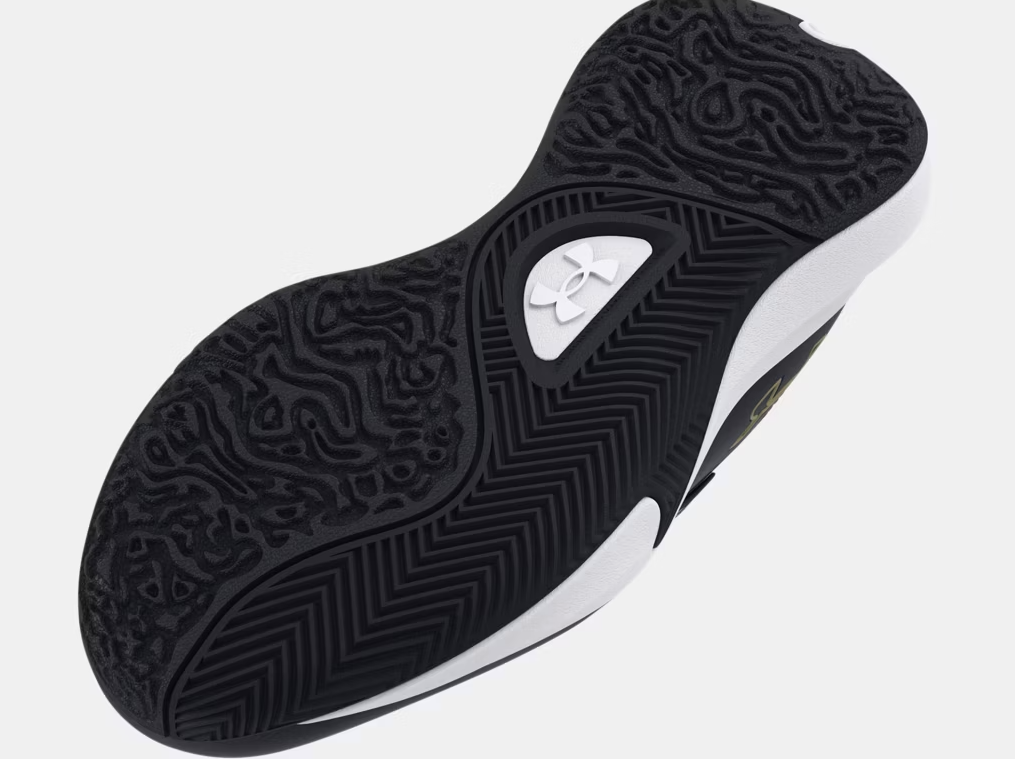 Espadrilles Lockdown 7 - Under Armour semelle extérieure noire et blanche avec logo, vue de dessous détaillée pour enfant.