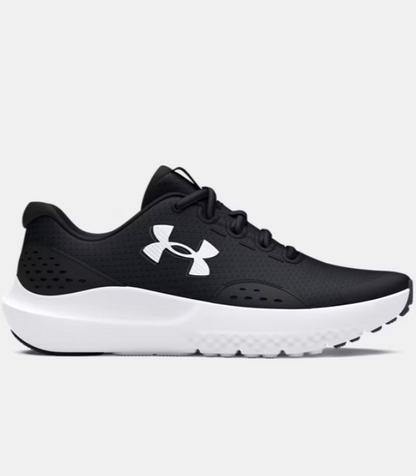 Espadrilles UA Surge 4 - Under Armour noires et blanches, tige en filet respirant, coussinage, vue de profil droit enfant.
