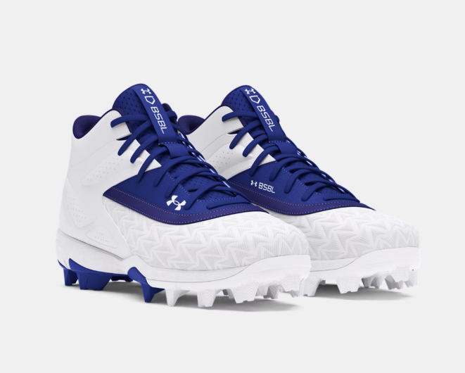 Chaussures de baseball - Under Armour blanches et bleues avec crampons en caoutchouc, pour garçon, vue de profil avant.