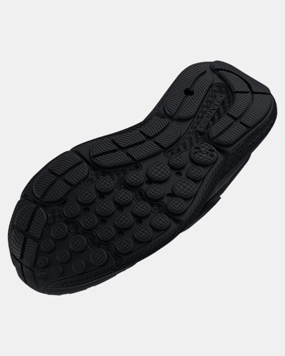 Semelle extérieure noire détaillée des Espadrilles UA Assert 10 AC - Under Armour pour garçon, vue en plongée dessous.