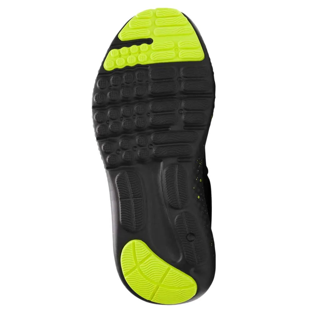 Espadrilles Surge 4 - Under Armour garçon, semelle noire et jaune fluo vue de dessous avec zones adhérence caoutchouc