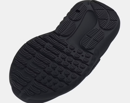 Espadrilles Surge 4 AC - Under Armour semelle noire en caoutchouc à motif adhérent, vue de dessous, pour garçon