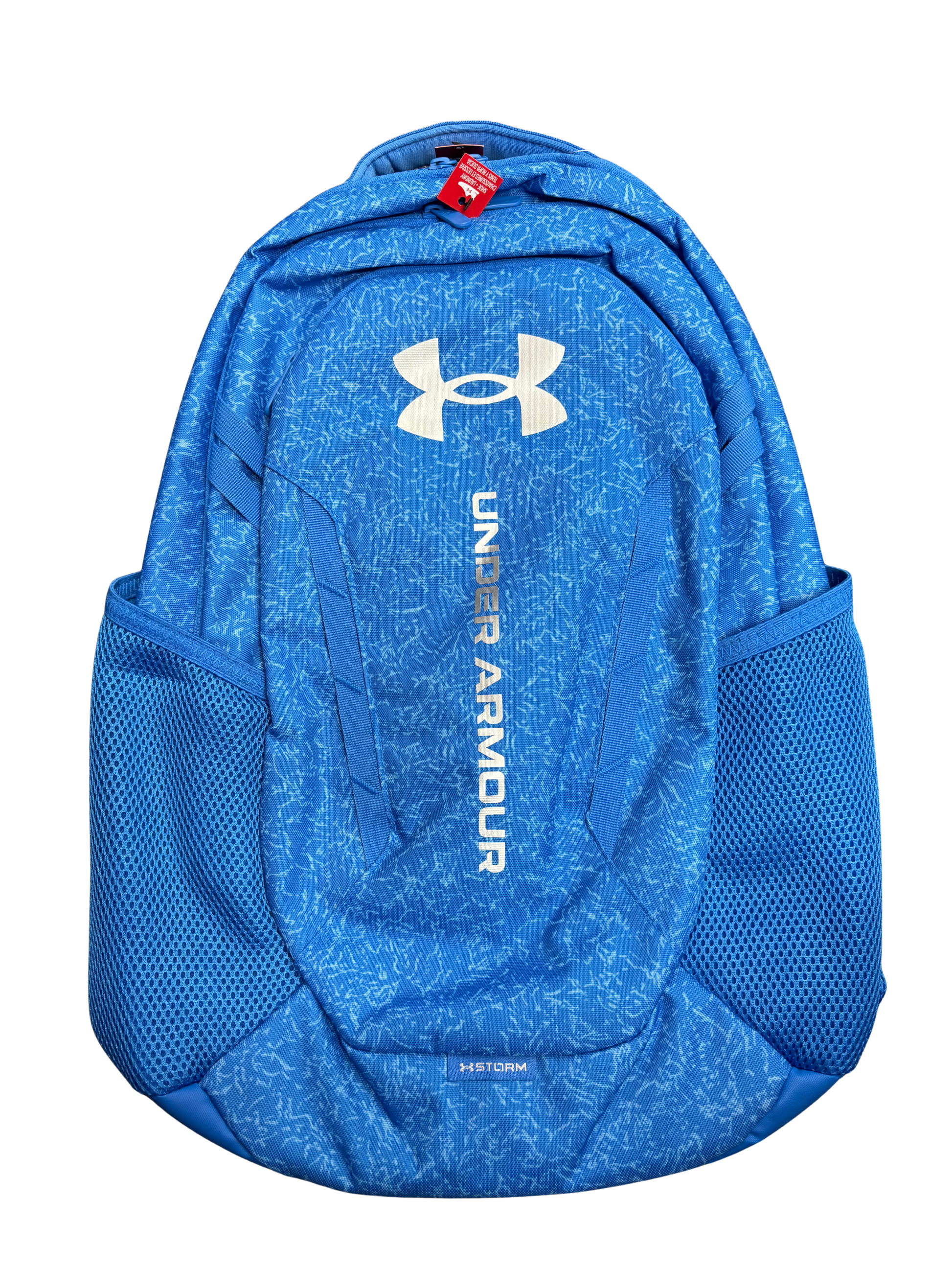 Sac à dos UA Hustle 6.0 - Under Armour bleu avec logo blanc, tissu résistant, poches latérales en mesh, vue de face.