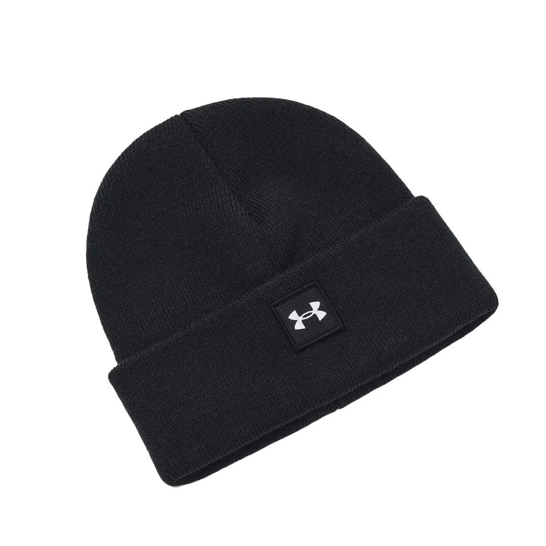 Tuque d'hiver - Under Armour noire en maille, style classique avec revers, vue de face sur fond blanc.