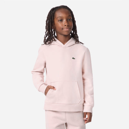 Hoodie - Lacoste rose clair en coton avec capuche et poche kangourou, pour enfant fille, porté de face sur mannequin.
