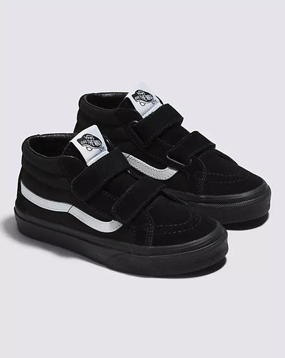 Chaussures - Sk8-Mid Reissu noires et blanches en toile et suède pour enfant, modèle mi-haut avec lanières, vue biais côté droit.