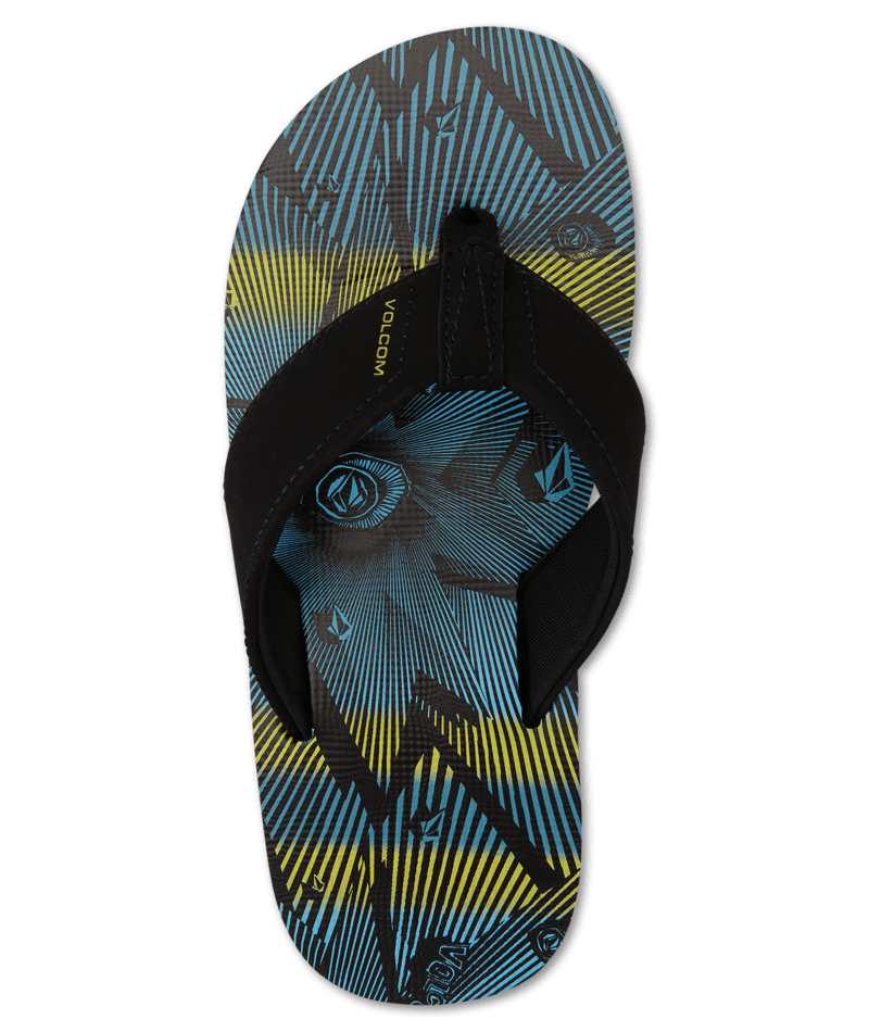 Sandales - Victor Big Volcom garçon noir et bleu avec motifs jaunes, style flip flop, vue de dessus détail de la semelle