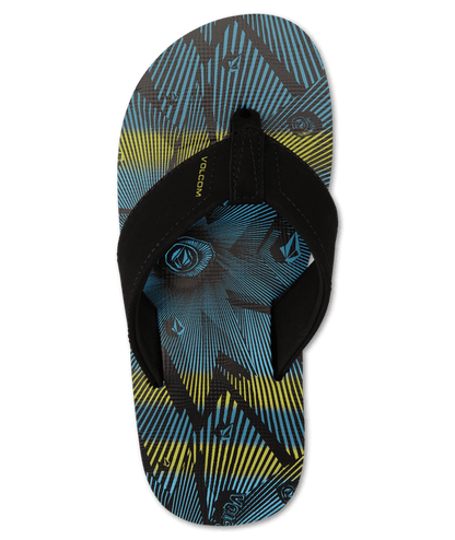 Sandales - Victor Big Volcom garçon noir et bleu avec motifs jaunes, style flip flop, vue de dessus détail de la semelle