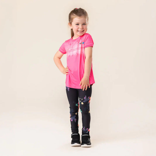 Legging - Nanö noir à motifs floraux colorés porté par enfant fille, vue de face, style ajusté en tricot double