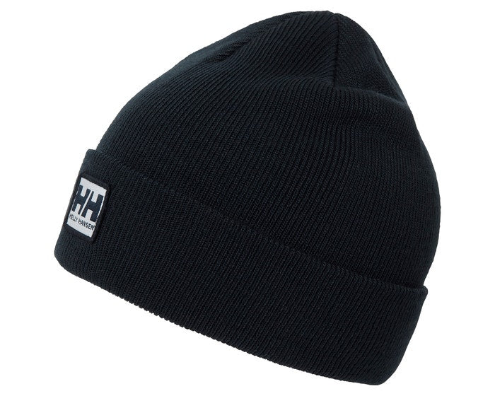 Tuque d'hiver - Helly Hansen noire en tricot double épaisseur, style classique, vue de côté avec logo visible.