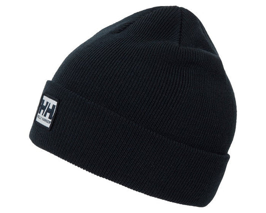 Tuque d'hiver - Helly Hansen noire en tricot double épaisseur, style classique, vue de côté avec logo visible.