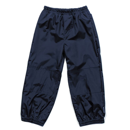 Pantalon d'extérieur - Nanö marine en tissu technique imperméable, pour enfant 7 ans, vue de face.