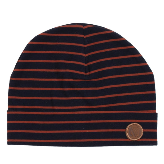 Tuque Mi-Saison - Nanö en jersey doux rayé marine et rouille, double épaisseur, vue de face, avec écusson en faux cuir.