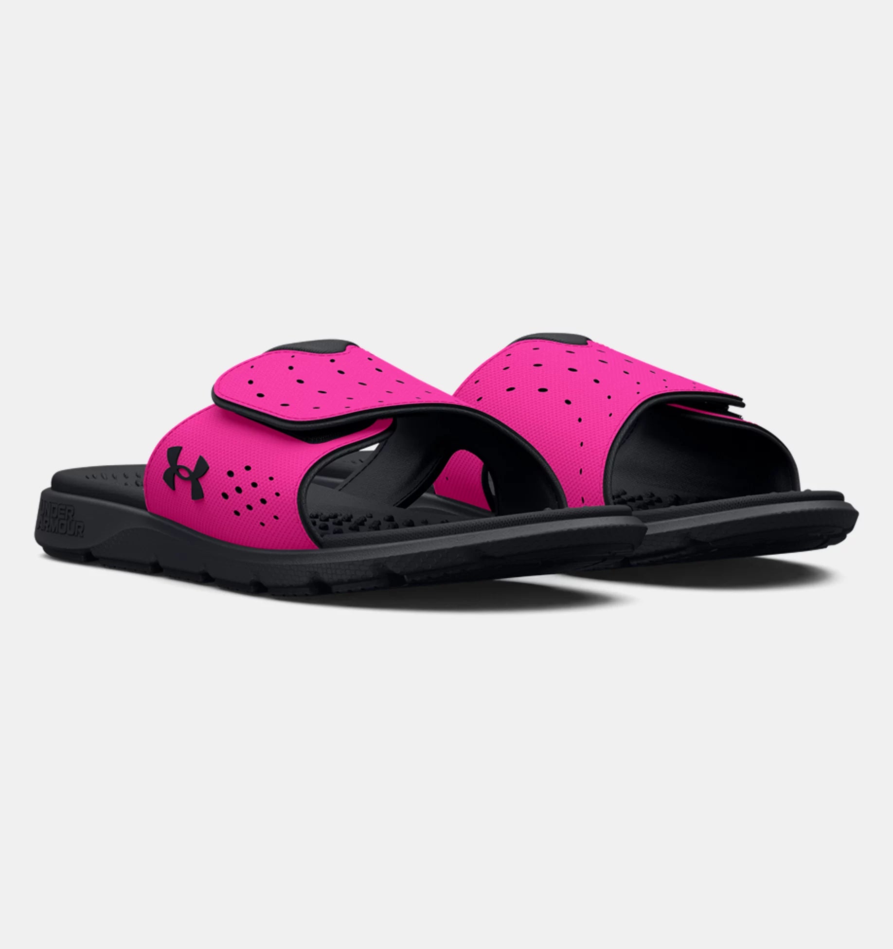 Sandales - Under Armour rose et noires pour fille, style glissière, matière synthétique, vue de côté en léger angle.